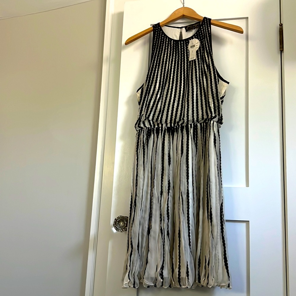 New with tags Women’s Anthropologie dress. Geisha Designs. Size 2
